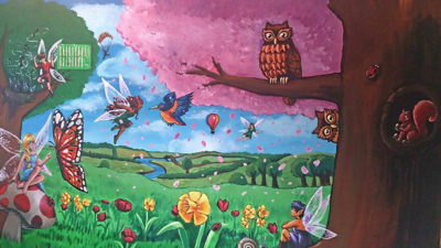 finished painting childrens woodland fairy mural